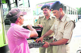 The police conducts a search operation at the ISBT-17, Chandigarh, on Friday. 