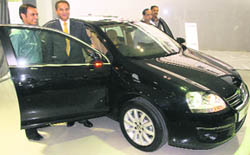 Volkswagen India managing director Makham Dhalivaal (2nd from left) poses with Jetta, which was launched in Chandigarh on Saturday. 