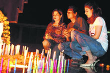 Residents light candles to pay homage to the Kargil martyrs at the war memorial in Sector 3, Chandigarh, on Saturday.