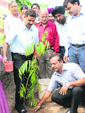 DPI (schools) S.K. Setia (left) along with staff members of Government High School-26, Chandigarh, during a plantation drive on Saturday.
