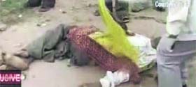 A man lying dead at the site of one of a series of blasts in Ahmedabad