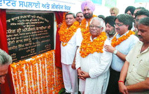 Local bodies minister Manoranjan Kalia inaugurates water treatment plant at Pholariwal in Jalandhar on Saturday.