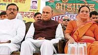 Chief Minister P.K. Dhumal (centre) at a rally in Chandigarh on Sunday.