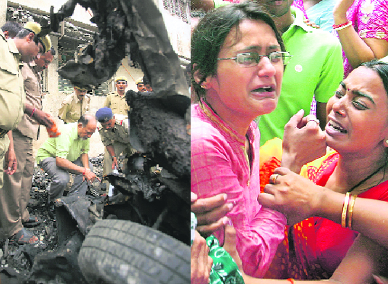 A forensic officer inspects the site of a bomb blast; and (right) relatives mourn during the funeral procession of bomb blast victims in Ahmedabad on Sunday.