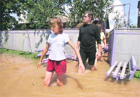 Ukraines President Viktor Yushchenko visits a settlement affected by floods in the Ivano-Frankivsk region