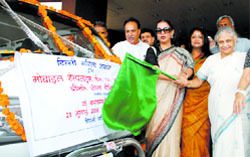 Delhi Chief Minister Sheila Dikshit, Delhi Commission for Women chairperson Barkha Singh and actress and former Rajya Sabha MP Shabana Azmi flag off a mobile Helpline during the launch of the Pre-Marital Counselling Centre of the DCW in New Delhi 