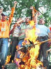 Members of the Akhil Bharatiya Vidyarthi Parishad holding a protest in front of the Deputy Commissioners office in Shimla on Monday.