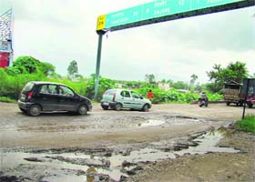 Rough patches are a common sight on the Pinjore-Baddi road