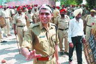 SP Satinder Singh tries to pacify mob