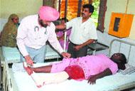 Doctors treating one of the injured in the melee