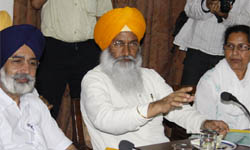 MP Sukhdev Singh Dhindsa (centre) addressing a press meet inBathinda on Wednesday.