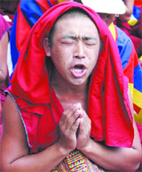 Tibetan Buddhist monks in exile shout slogans against the 2008 Beijing Olympic Games, in New Delhi