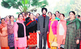 A file photo of Ishmeet Singh with his teachers during his recent visit to Guru Nanak Public School