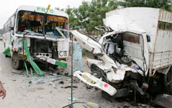 Wreckage of a PRTC bus and a private canter that collided head-on on Bathinda-Chandigarh National Highway near Bhucho Mandi
