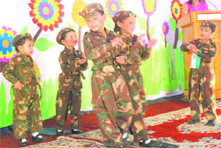 Tiny tots present a dance during the inauguration of Shaurya Army Pre-School 