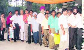 Assessees submit their income tax returns at Udham Singh Nagar in Ludhiana on Thursday.