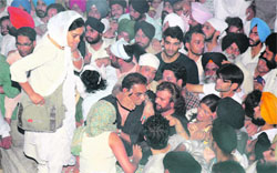 Singers Hans Raj Hans and Abhijeet at the funeral of Ishmeet Singh in Ludhiana