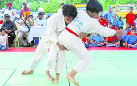 Judokas in action during the Ist Open District Judo Championship held at Golden Bells Public School, Sohana, on Friday. 