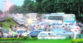 Traffic chaos at the roundabout of Sectors 34 and 35 in Chandigarh on Friday. 