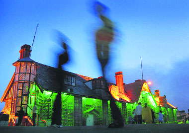 The illuminated building of the Municipal Corporation of Shimla giving a royal touch with the formation of colours in the evening in Shimla on Saturday. 
