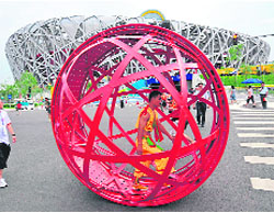 A dress rehearsal went ahead in the evening despite security breaches that led to footage of an earlier practice leaking out. Performers prepare outside the National Stadium ahead of a rehearsal for the Olympic Games opening ceremony in Beijing. 