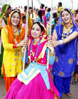 Colours of carnival: Girls celebrate Teej festival at a function organised by the Devta Yaadgari Manch in Bathinda