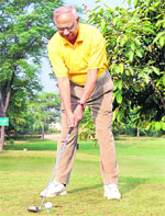 State Bank of Patiala MD A.C. Verma plays golf during State Bank of Patiala Open Golf Tournament at Golf Club, Patiala