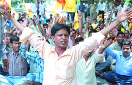 Workers of the Naya Daur Party up in arms against terrorism in New Delhi on Sunday.