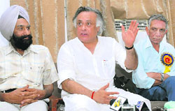Union minister of state for power Jairam Ramesh (centre), along with PSEB chief Y.S. Ratra (right), addresses mediapersons at Lehra Mohabbat in Bathinda on Sunday. Tribune photo: Malkiat Singh