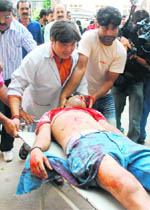 An injured person being shifted to the Government Medical Hospital in Jammu on Monday.