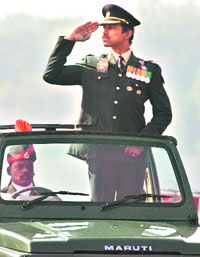 In this picture taken on January 15, 2007, Indian Army officer and Olympic silver medalist Rajvardhan Rathore salutes during the Army Day parade in New Delhi. 