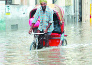 Though showers gave respite from the oppressive weather, water-logging in most of the areas gave commuters a tough time.