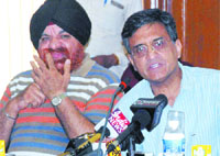 Delhi University vice-chancellor Deepak Pental addresses a press conference in New Delhi