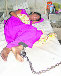 Madhu chained while under treatment at the Civil Hospital in Ambala.