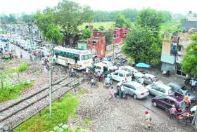 Long traffic snarls are a regular feature near Ladowali railway crossing in Jalandhar