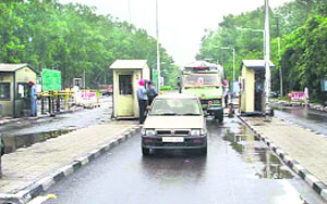A vehicle passes on Tuesday after the toll barrier was shifted to Satluj Bridge. 