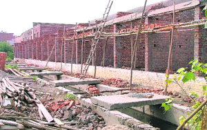 Shops coming up near a nullah in Transport Nagar in Ludhiana. 