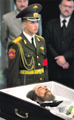 The body of writer and former Soviet dissident Alexander Solzhenitsyn lies in the Academy of Sciences in Moscow