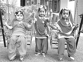 Tiny tots celebrate Teej at Little Hearts Pre-School in Patiala on Wednesday.
