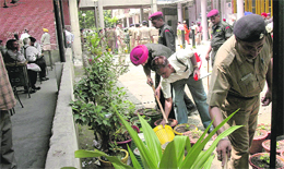 Policemen search the district courts complex after receiving a bomb hoax call in Chandigarh on Wednesday.