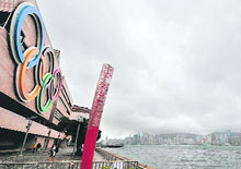 Storm clouds gather over Victoria Harbour in Hong Kong on Wednesday. Hong Kong was lashed by fierce winds and rain as the city prepared to host the equestrian events of the Beijing Olympics, but organisers said they were ready for the worst nature has to offer. 