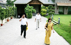 IT officials coming out of the house of business tycoon in Bathinda