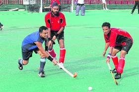 Players in action during Air Force Hockey Championship at hockey stadium, Sector 42, Chandigarh