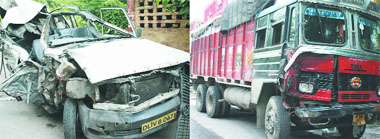 The HCL cab (left) that collided with a truck (right) on the DND flyover in New Delhi