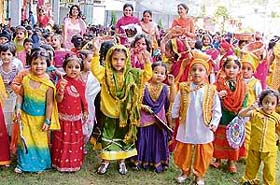Tiny tots of Green Land Senior Secondary School celebrate Teej on the school premises in Ludhiana