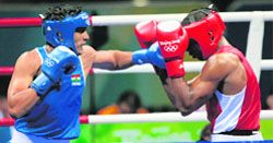 Indias Vijender Kumar (L) fights against Gambias Jack Badou G J during their 2008 Olympic Games Middleweight (75 kg) boxing bout in Beijing