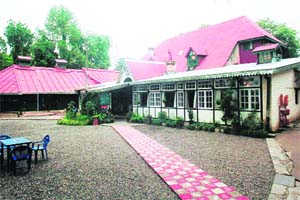 The Kasauli Club is one of the few spaces that blends with the scenic surroundings