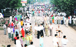 Residents of Kheri Sadh village hold a protest on the 