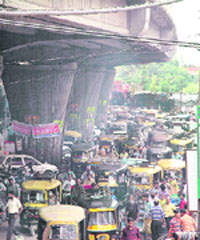 Vehicles caught up in a traffic jam under a bridge in Ludhiana.