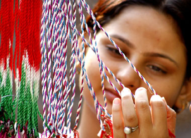 With the festival of Raksha Bandhan approaching, a girl is engrossed in selecting rakhi in Bathinda on Monday. Celebrated to observe the relationship between brothers and sisters, the festival is held on the full moon of the month of Shravana.